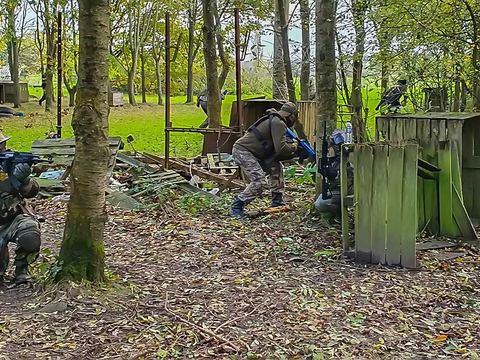 Players advancing through the trees
