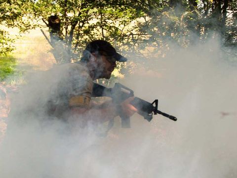 A player moving through smoke