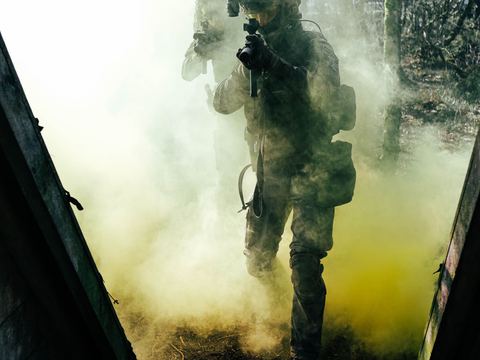 A player stepping through yellow smoke