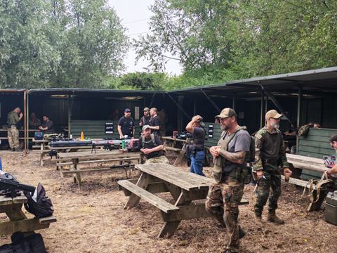 The covered safe zone with picnic benches