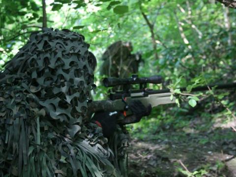 A ghillie suited sniper