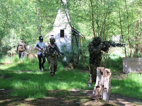 Players moving through a clearing