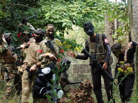 Players gathered in the woods