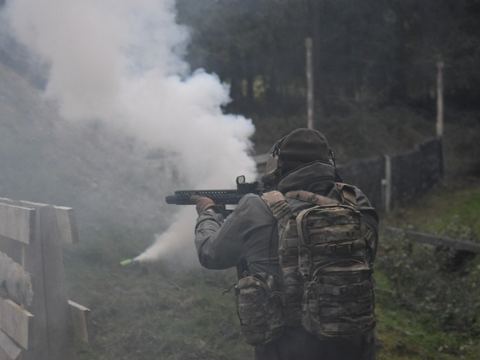 A player moving through smoke