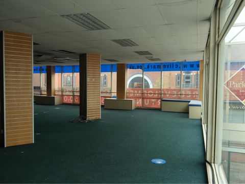 Empty shop unit with pillars