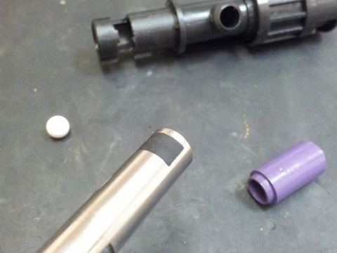 Hop-up unit, inner barrel and R-hop bucking laid out for a TM recoil M4 build