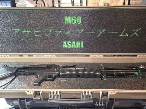 Asahi M60 laid out in a cut foam case