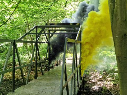 Smoke grenades by the bridge