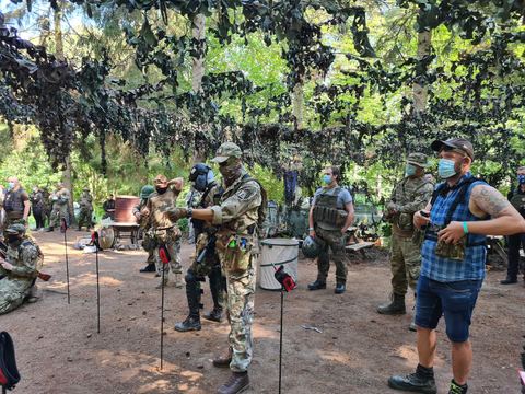 Safety brief under the camo netting