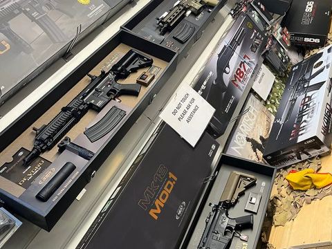 Airsoft rifles on display in the shop