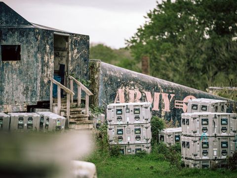 Army huts and crates in the urban area
