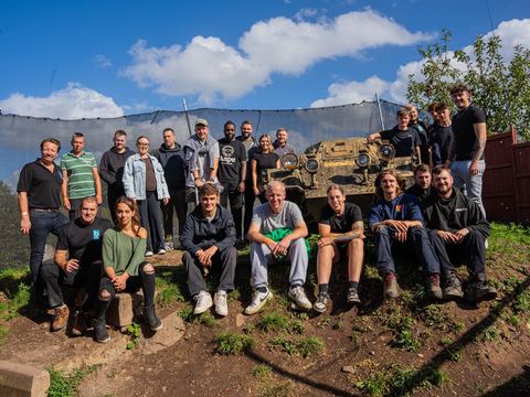 Group photo of players at the site