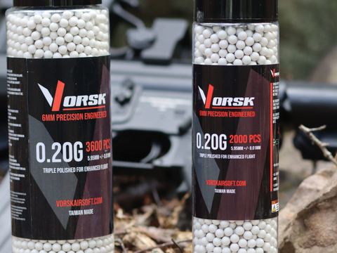 Bottles of Vorsk 0.20g BBs photographed outdoors