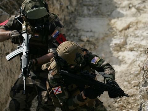 Climbing out of a trench