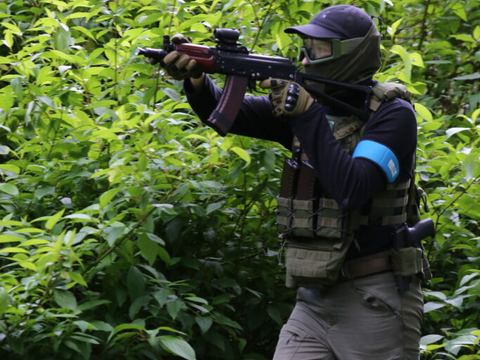 Player moving through dense greenery