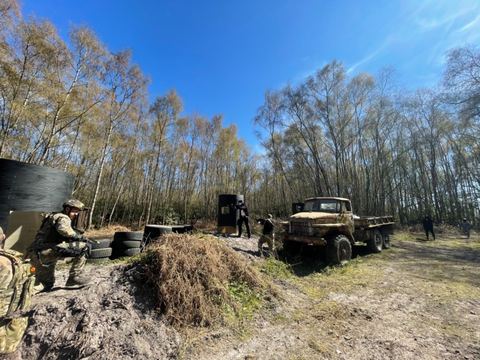 Players around the vehicles