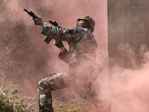 A player moving through smoke