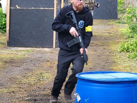 A player moving between barrels