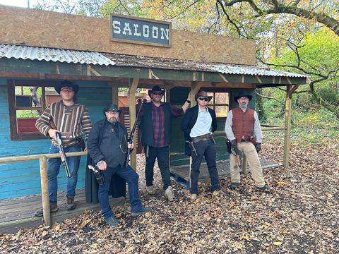 Players outside the saloon on a themed day